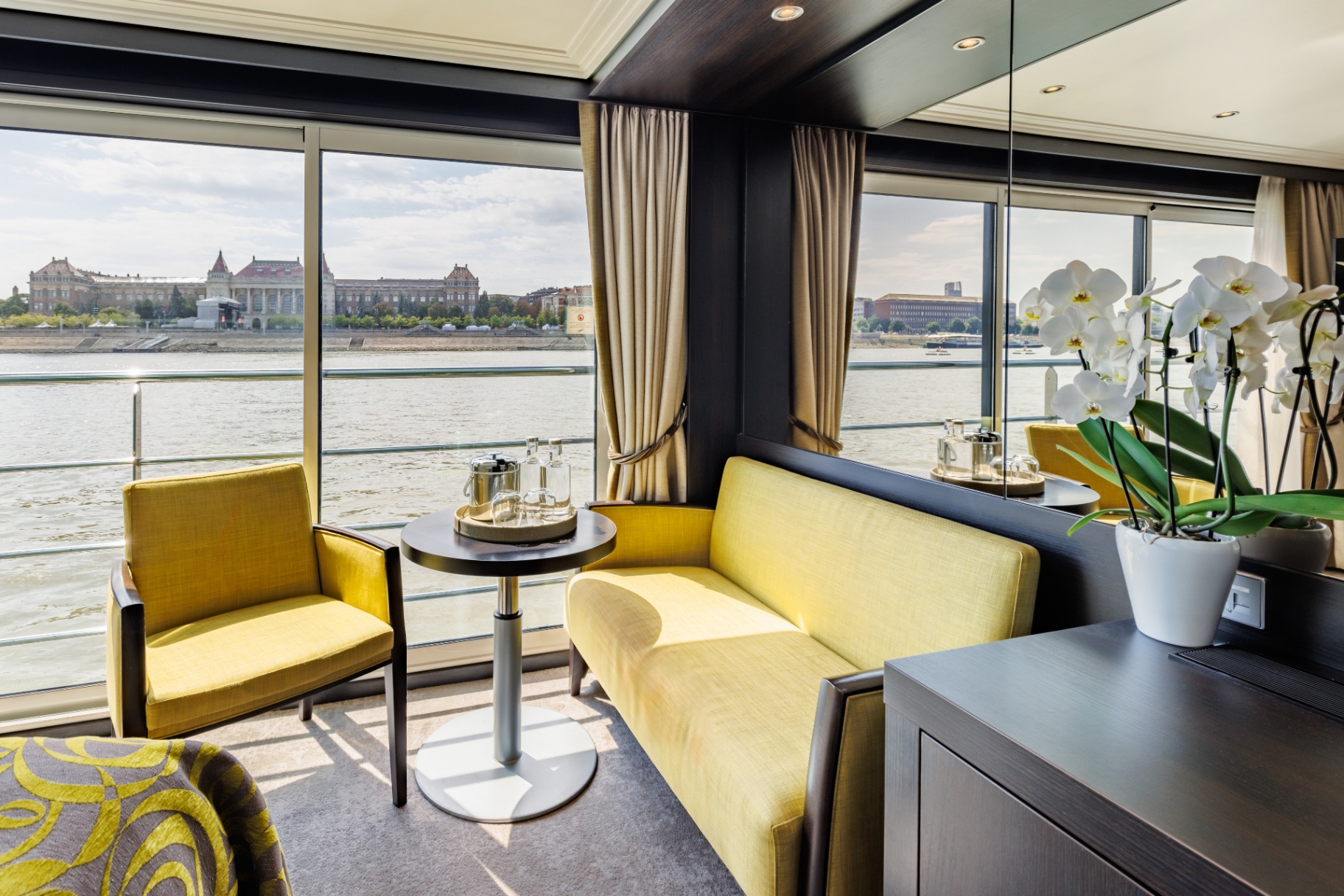 Suite seating · floor-to-ceiling glass